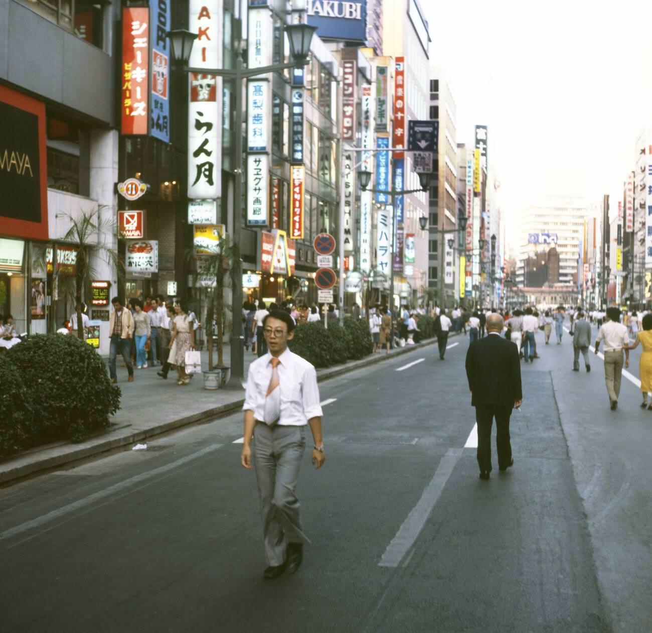 People walk down the street, Tokyo, 1978.