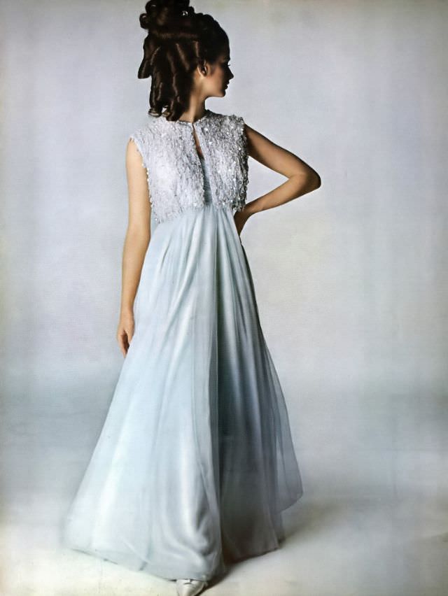 Veronica Hamel in a misty blue chiffon gown, 1965.