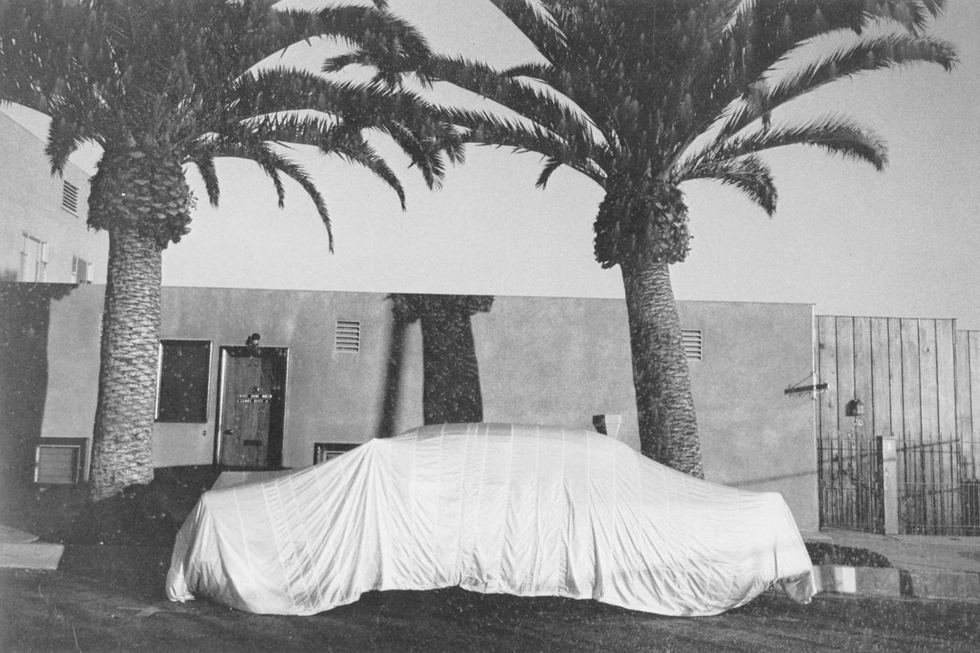 Covered car in Long Beach, California, 1956
