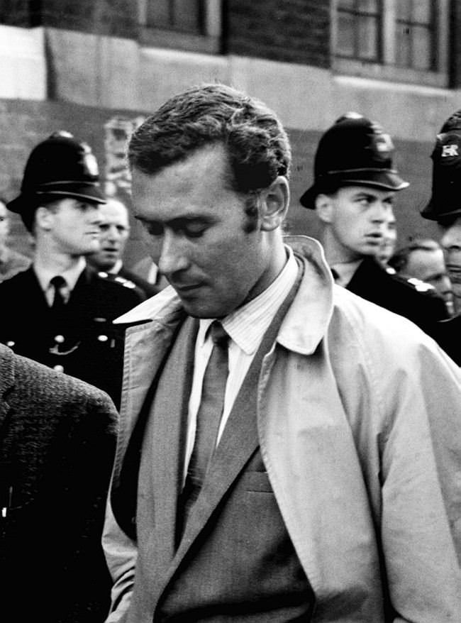 Playwright John Osborne (hands in pockets) who was one of the many arrested during an eight-hour ban-the-bomb sit-down demonstration in Trafalgar Square, London walks through London after being fined 1 at court, 1961.