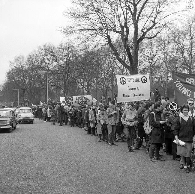 A long column of ban the bomb marchers arrive at Hyde Park, London. The march had started from the Atomic Weapons Research Establishment at Aldermaston, 1963.