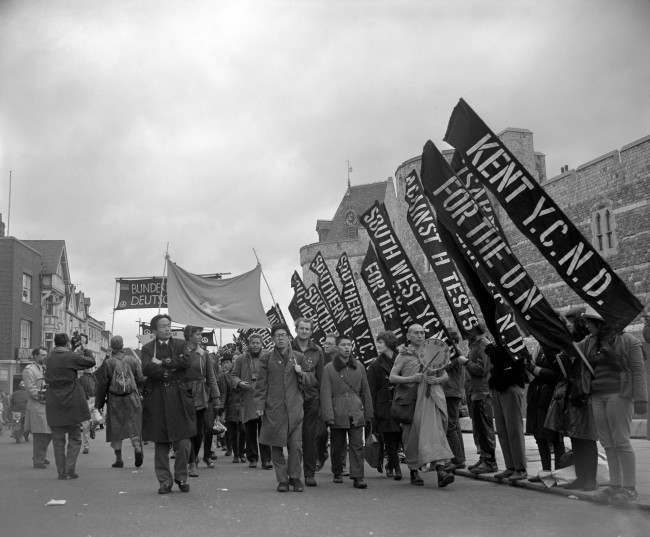 A group of campaign marchers from Hiroshima, Japan, pass Windsor Castle, 1963.