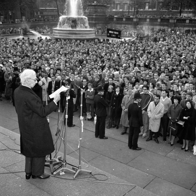 Earl Russell speaking from the plinth of Nelson’s Column in Trafalgar Square at a protest meeting organised by The Committee of 100, the anti-bomb organisation, 1961.