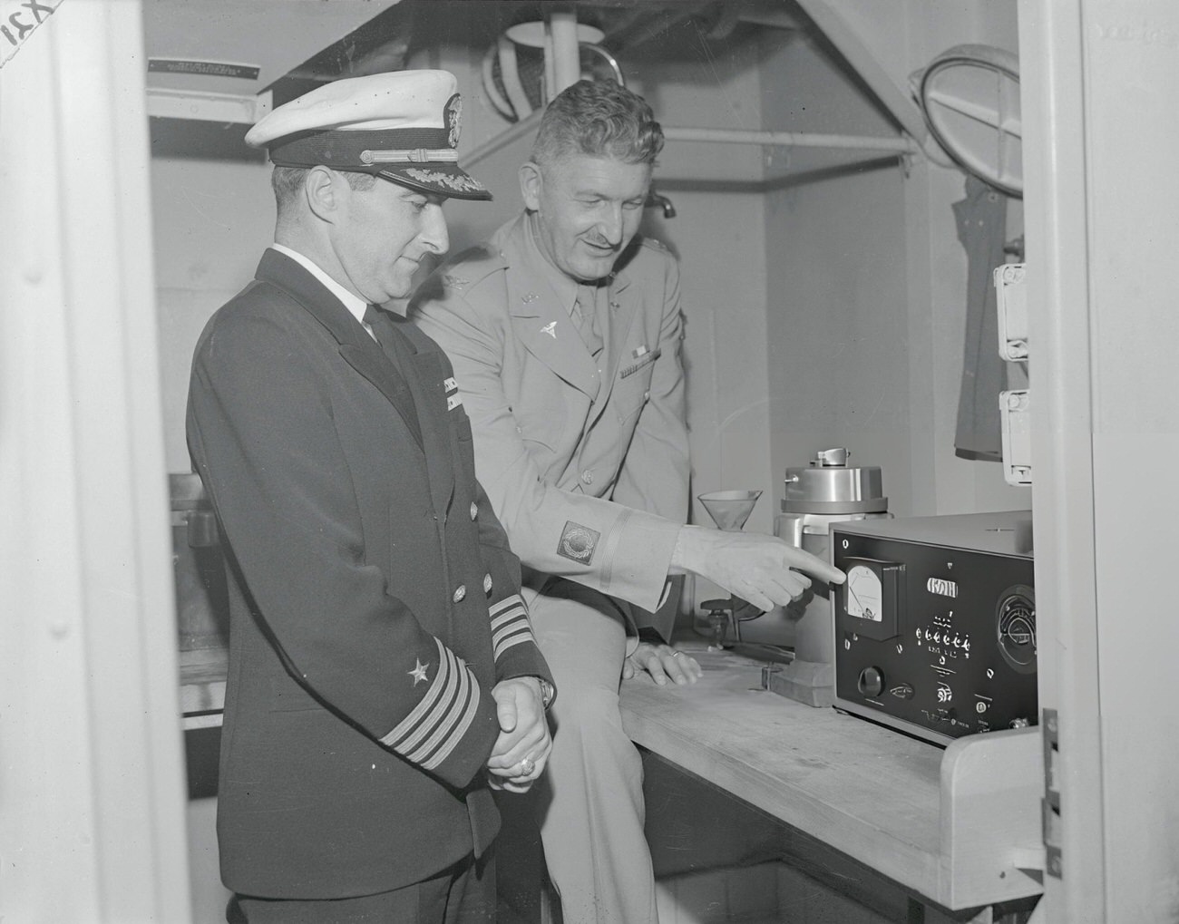 A Geiger-counter is shown aboard the USS Haven, preparing to sail from San Francisco Bay for Operation Crossroads, 1946.