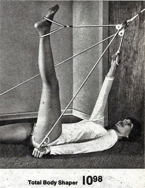 With these old contraptions, sometimes it’s hard to tell if we’re looking at a fitness product advert or a photo shoot for a bondage fetish magazine.