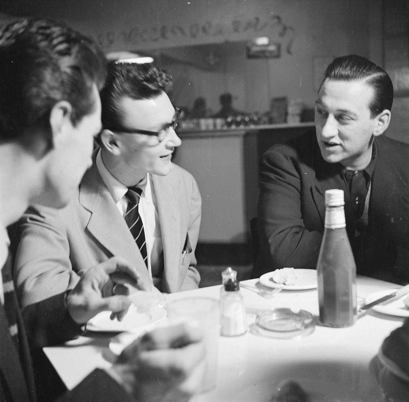 Tony Crombie and Derek Humble at a table in the Harmony Inn, by  Nigel Henderson, 1954