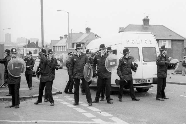 Riot police at the ready to stamp out any trouble, 1980s.