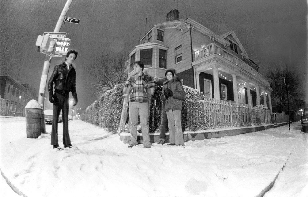 A family in front of their home in Boro Park, Brooklyn, 1977.