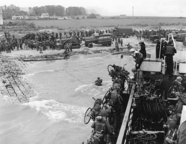 Soldiers of the 2nd Canadian Flotilla are seen as they establish a beachhead code-named Juno Beach, near Bernieres-sur-mer, on the northern coast of France, 1944.