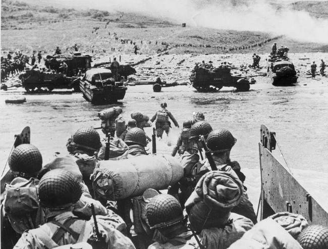 American soldiers and supplies arrive on the shore of the French coast of German-occupied Normandy, 1944.