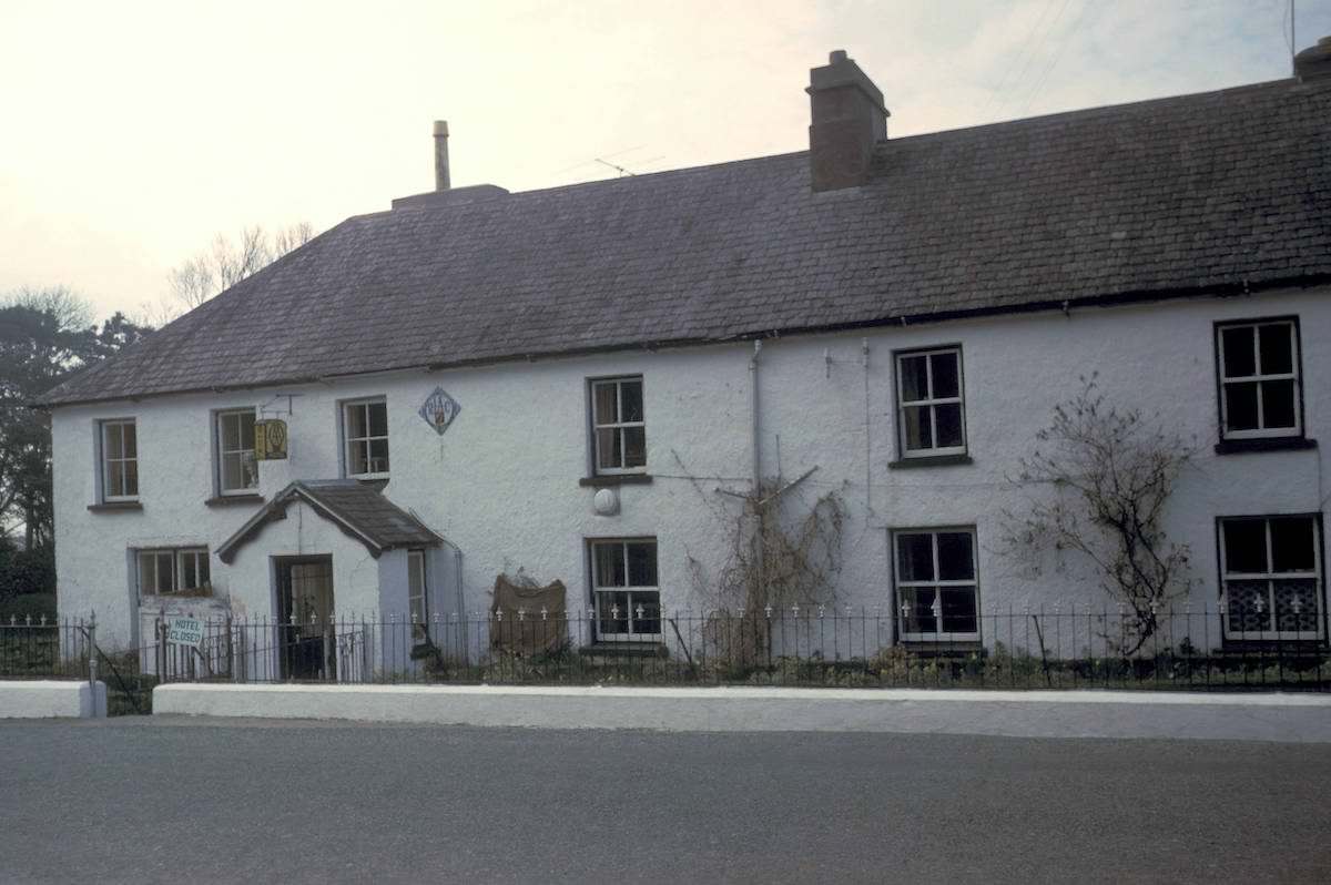 Hotel with closed sign on gate – 1964