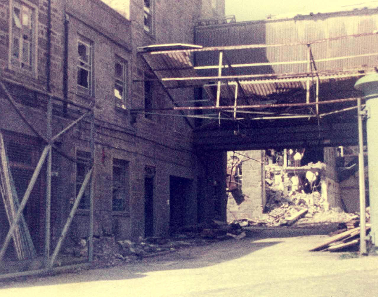 Upper Dens being demolished, 1982 Demolition commences at the Crescent Street entrance to the Upper Dens jute works in 1982.