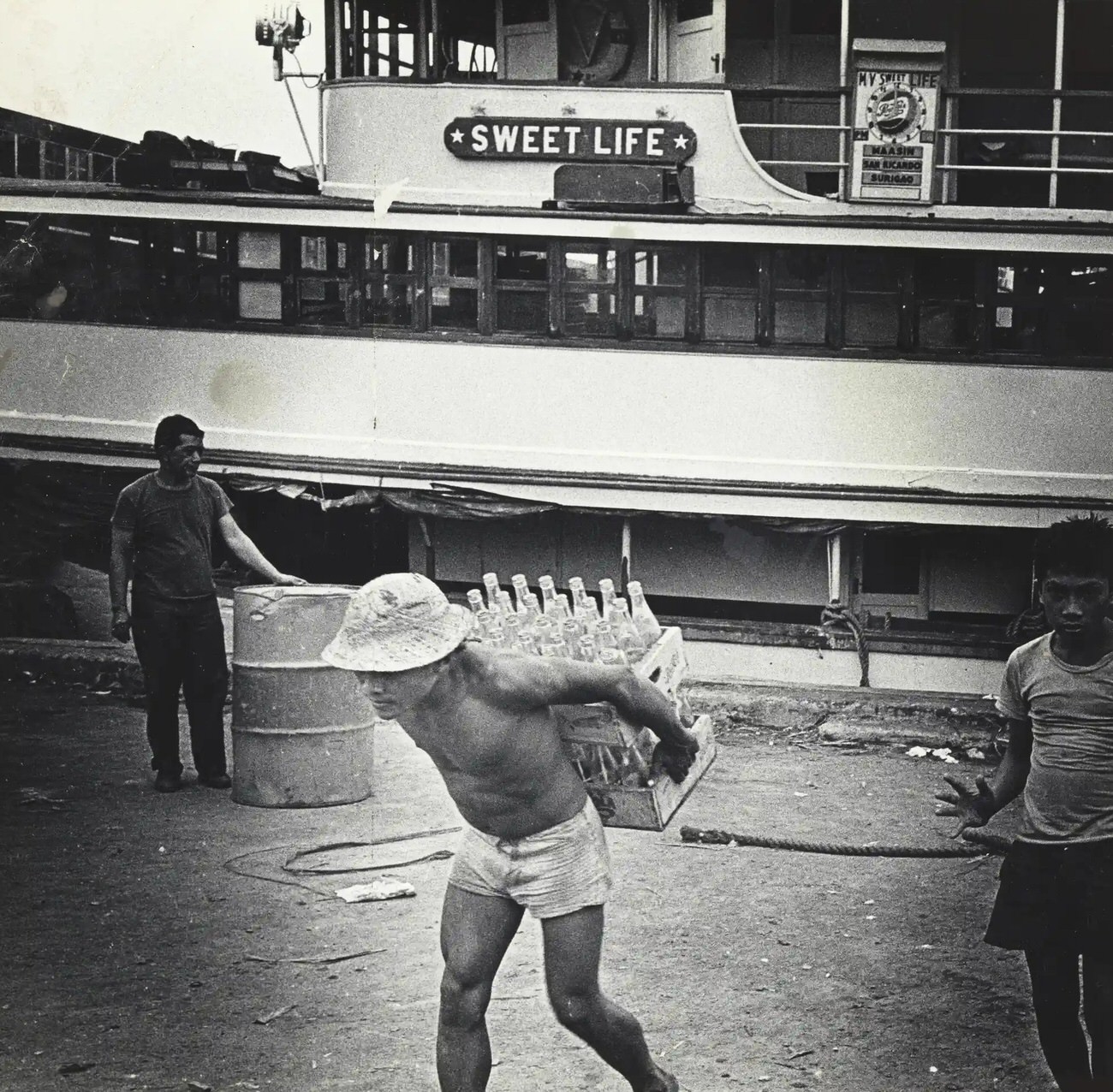 Docker near the passenger ship Sweet Life, Cebu city. Philippines, 1959