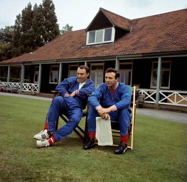 England’s Jimmy Greaves and Jimmy Armfield take it easy during a training session at Roehampton, 1966.