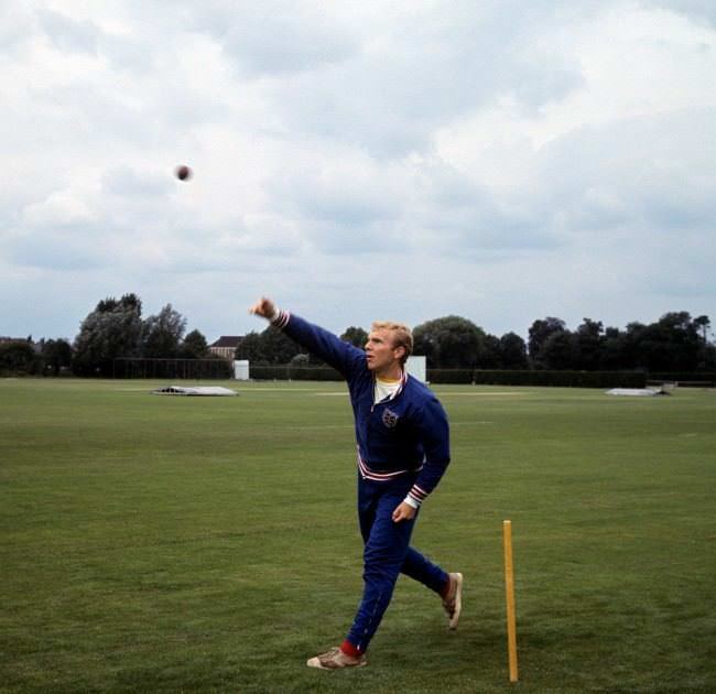 England captain Bobby Moore tries his hand at cricket during a training session at Roehampton, 1966.