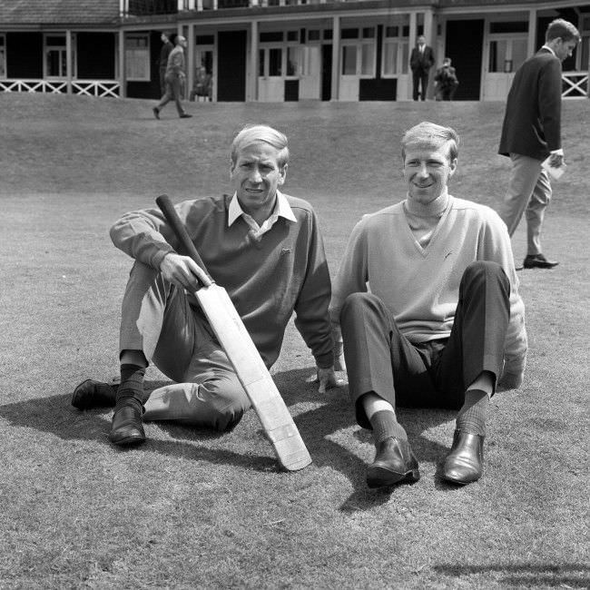 England’s Charlton brothers, Bobby (l) and Jack (r), relax after a game of cricket, 1966.