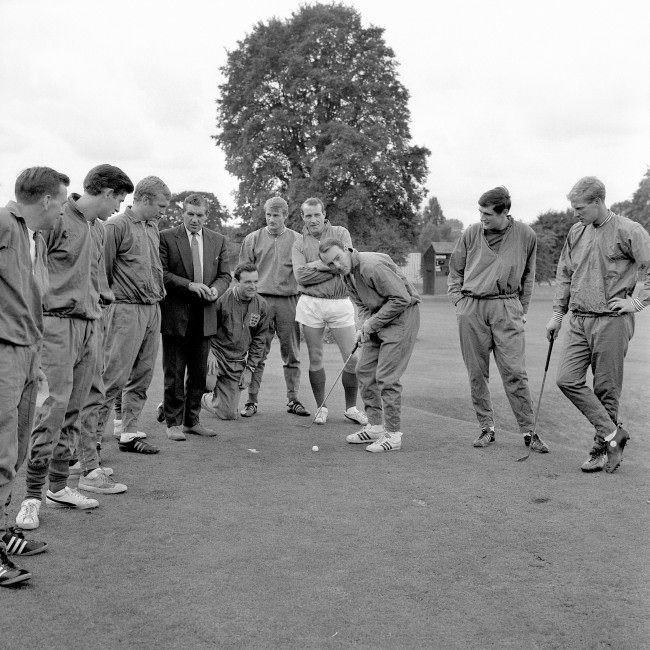 England’s Jimmy Greaves (third r) lines up a putt as he and his teammates take a break from the serious business of preparing for the World Cup Final, 1966.