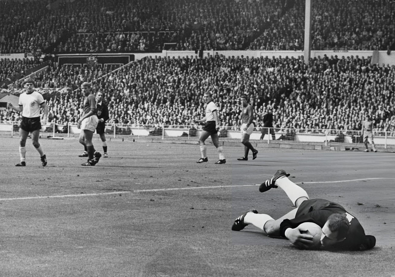 West German goalkeeper Hans Tilkowski saves a shot by England's Bobby Charlton, 1966.