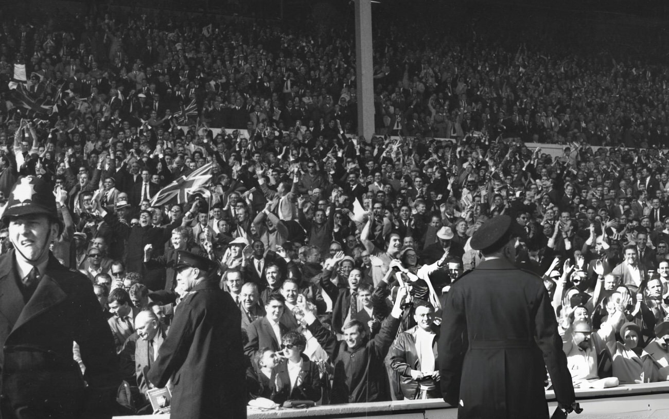 German football fans at Wembley Stadium, London, for the World Cup Final match, 1966.