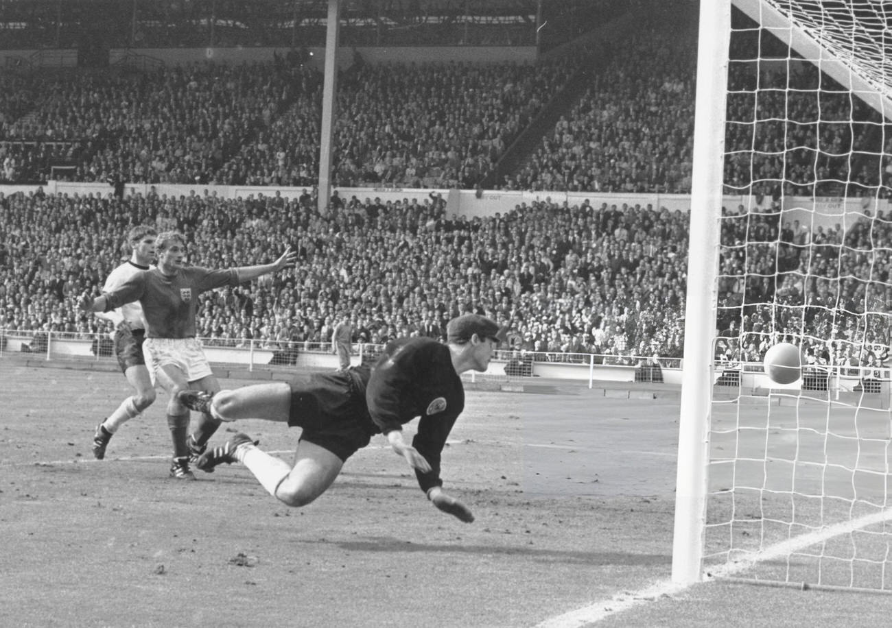 German goalkeeper Hans Tilkowski dives for the ball during the final of the World Cup, 1966.