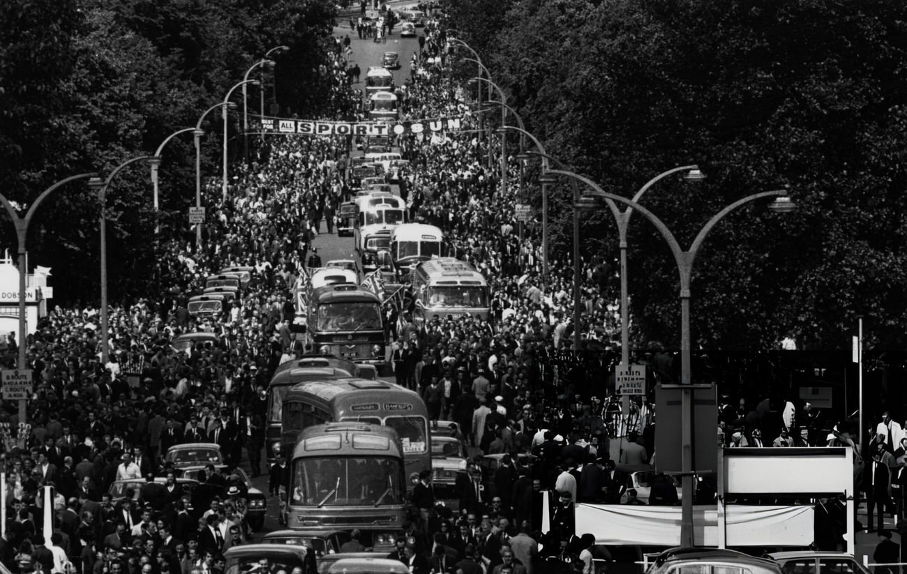 Crowds arrive at Wembley Stadium, London, for the 1966 World Cup Final, 1966.