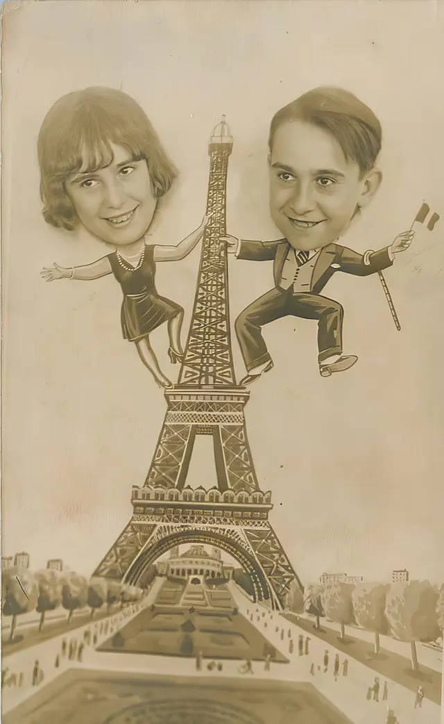 A boy and girl climb the Eiffel Tower in this arcade photo.