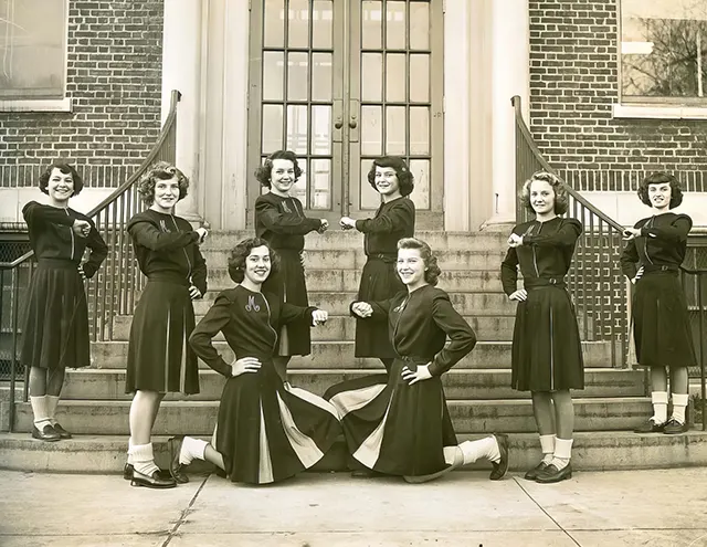 High school cheerleaders practicing.