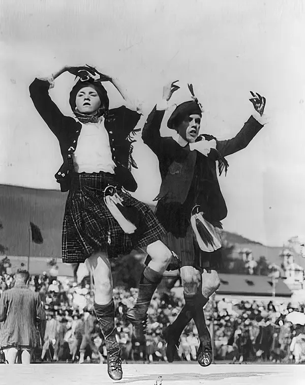 Boy and girl dancing in Scotland, 1900-1925.