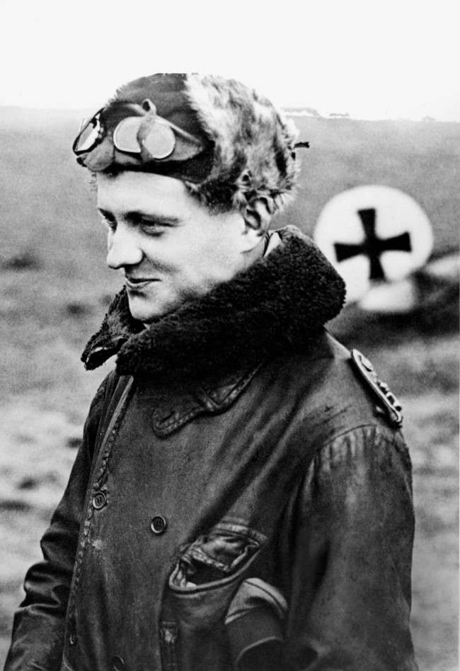 German airman Manfred von Richthofen, called the “Red Baron,” is shown returning from a mission at his squadron’s aerodrome at the Front in World War I in 1916. #24