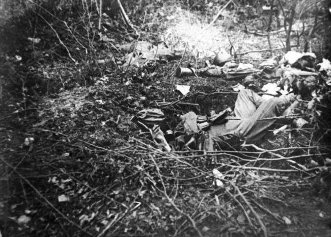 Belleau Wood showing dead German soldiers in France .