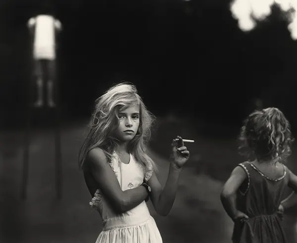 Candy Cigarette by photographer Sally Man, 1989.