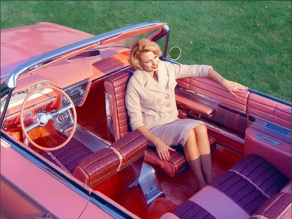 A woman experiences heaven in the 1961 Buick “Flamingo” equipped with a rotating front seat.