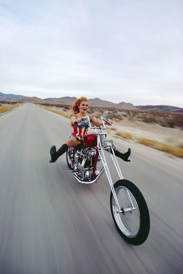 Ann Margaret totally rocking it out on her bike, 1969.