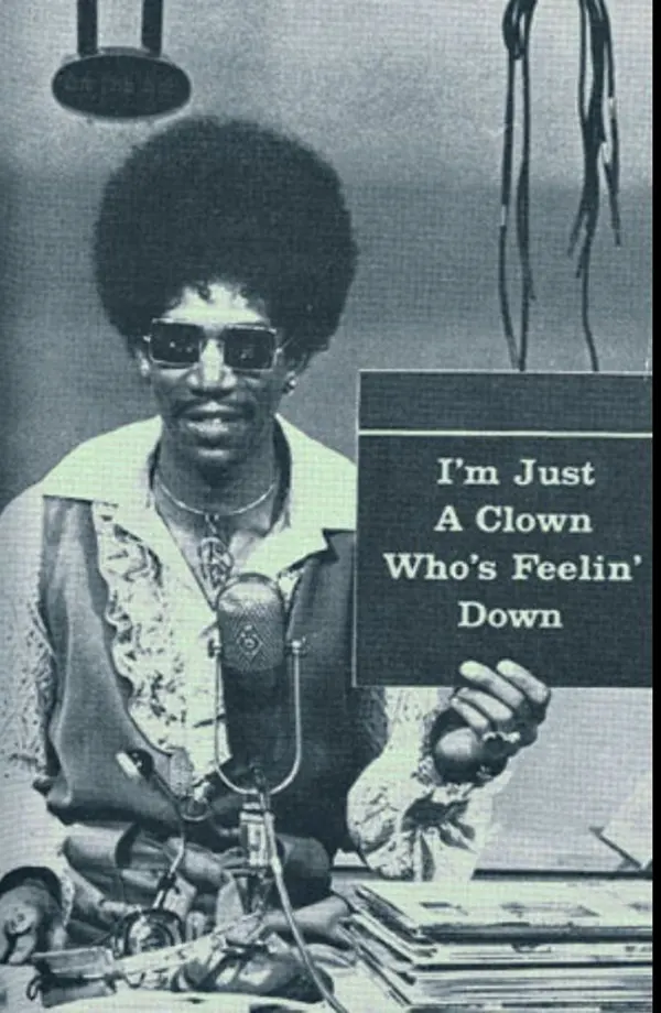 Morgan Freeman sporting a wicked afro in the 1970s.