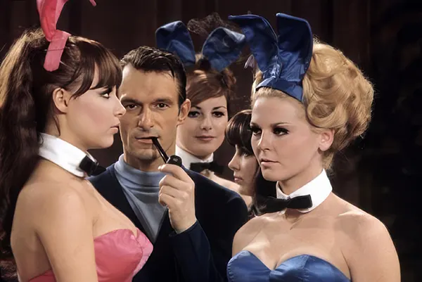 Hugh Hefner with his new bunnies, 1970s.