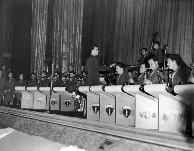 Capt. Glenn Miller, who has come to Britain with the American band of the Supreme Allied Command, gave Londoners a treat by appearing with his band at a gala premiere of the new Bing Crosby Film, ÂGoing My Way, at a West End Movie Theater in London, August 5, 1944.