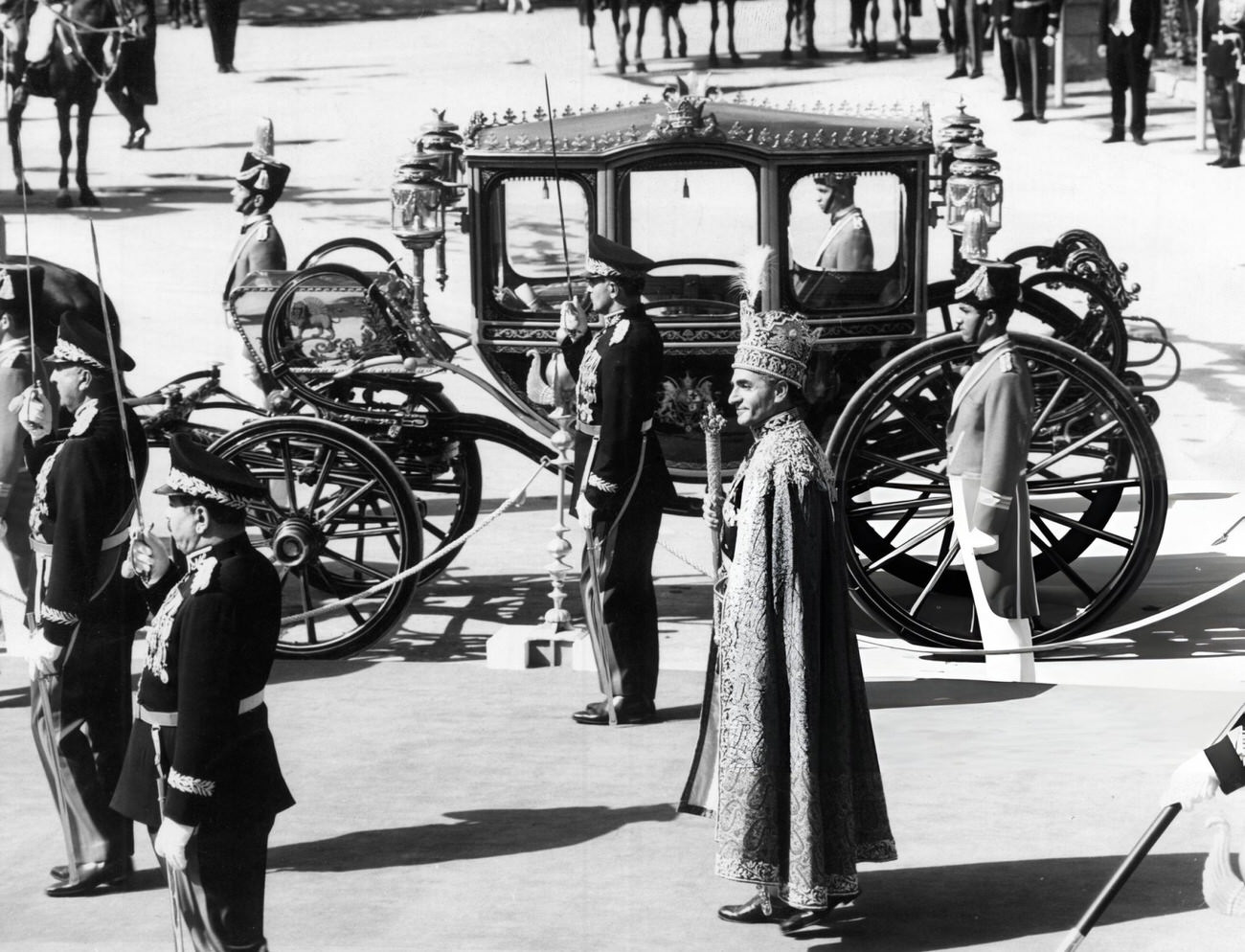 Shah of Persia Reza Pahlavi leaving Golestan Palace after his coronation to reach the golden carriage, Tehran, 1967.