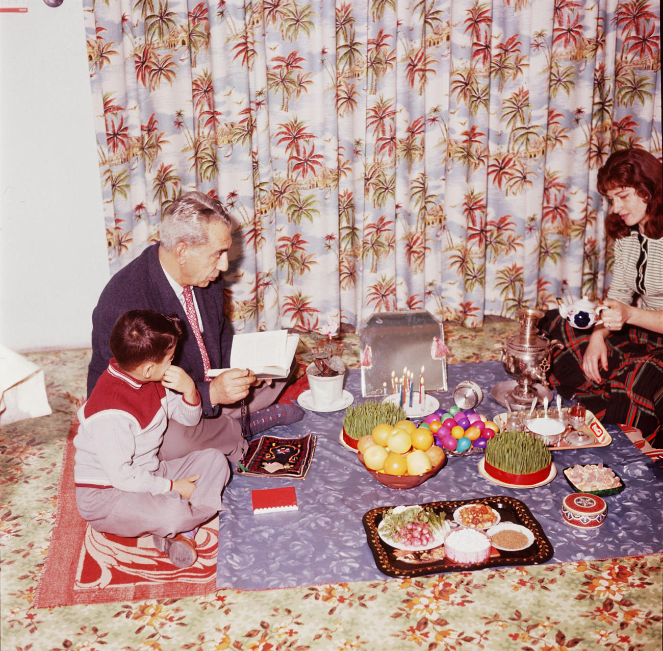 A family gathers for a ceremony celebrating Nou-Roz, the Iranian New Year, 1960s.