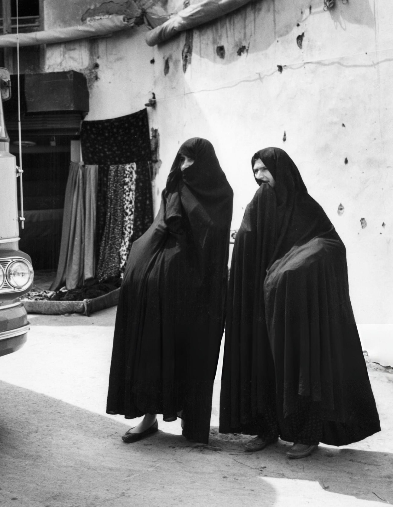 Veiled women walking in the streets of Tehran, Iran, 1960s.