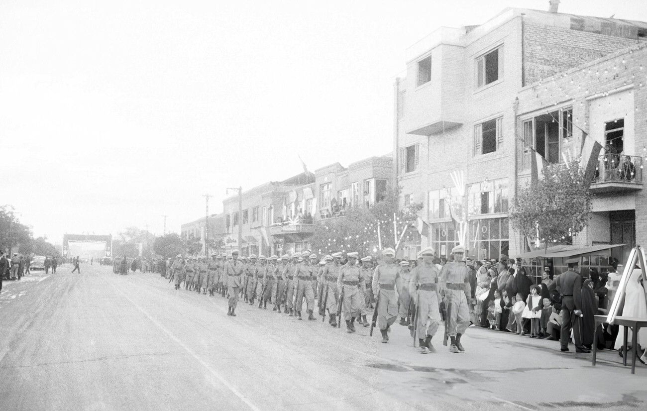 A military parade in the streets of Tehran for the birth of Prince Reza Cyrus Pahlavi, Tehran, 1960.