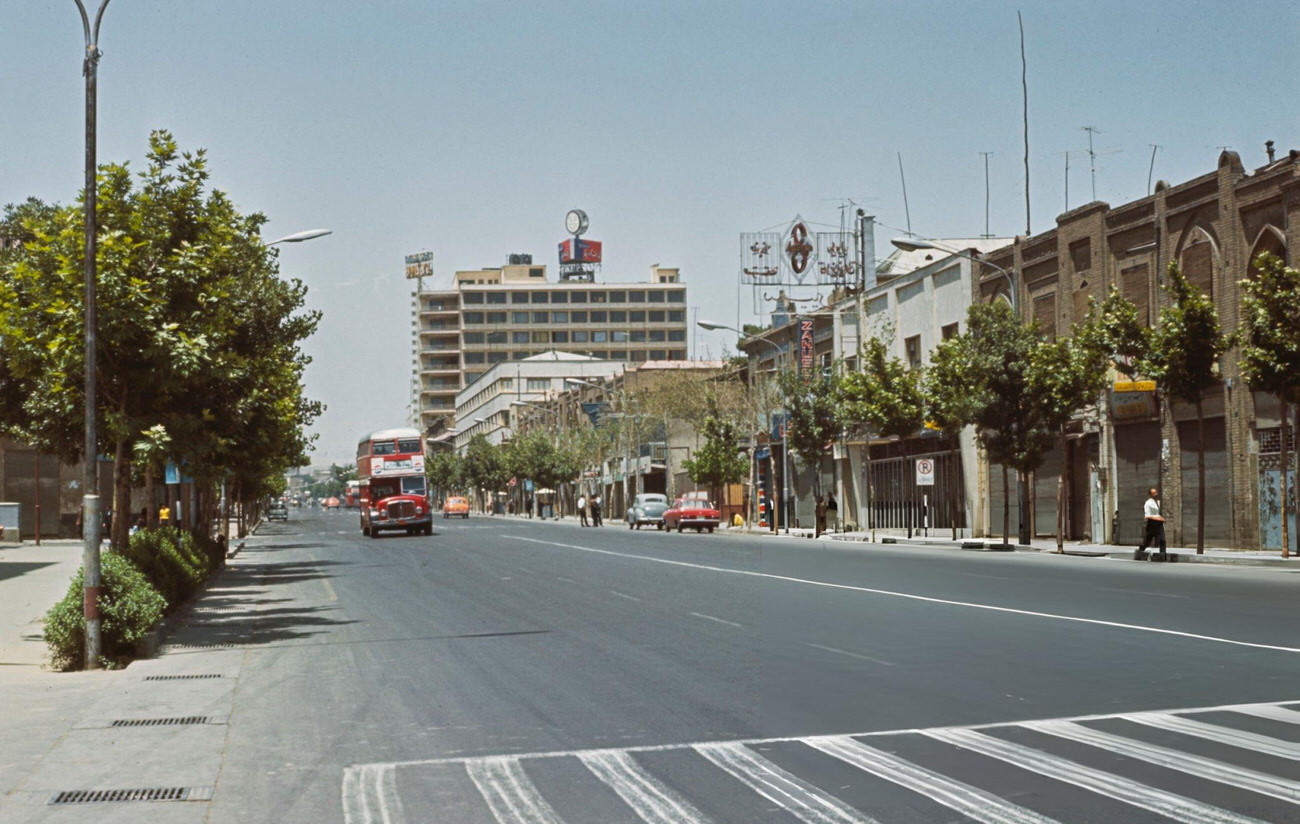 Double-decker buses and cars driving along Ferdausi Street in Tehran, the capital of Iran, 1967.