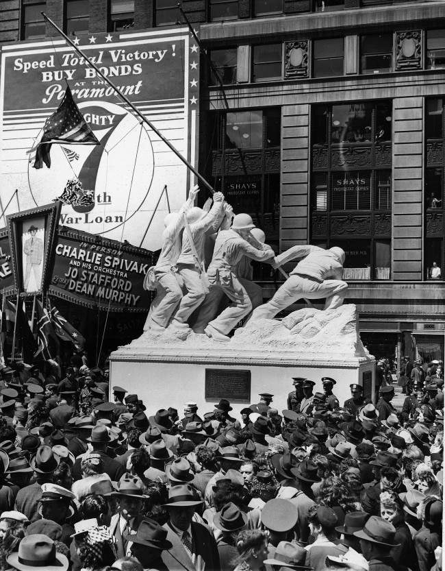 Hundreds look on during the unveiling of the 50-foot statue of the Iwo Jima flag-raising, a reproduction of AP photographer Joe Rosenthal’s Pulitzer Prize winning picture, 1945.