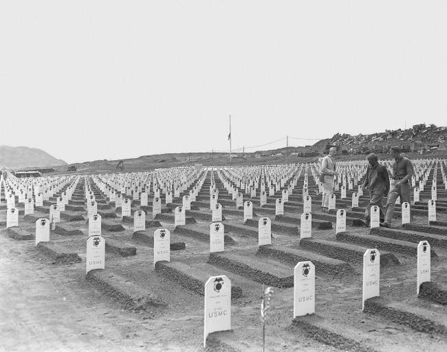 White markers designate the final resting place for hundreds of Third and Fourth Marine Division fighters, who died during invasion of Iwo Jima in World War II, in this cemetery located near the beach where the U.S. Marines first established a beachhead, 1945.