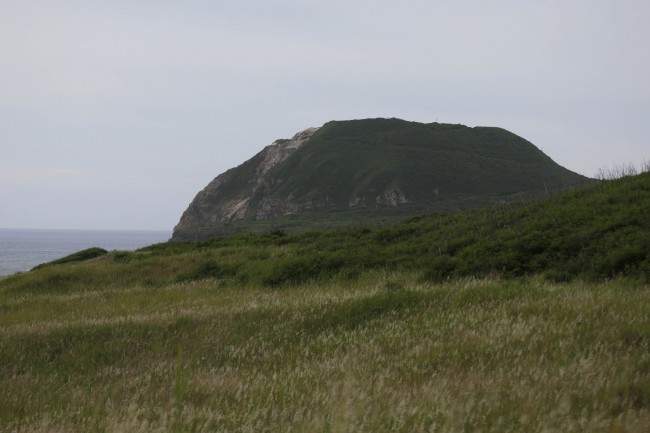 Mt. Suribachi, is seen from Invasion Beach on Iwo Jima, Japan, 2013.