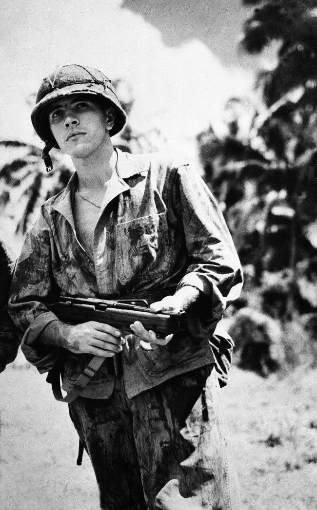 Marine Sgt. Michael Strank, reported killed in action on Iwo Jima, was identified as one of the marines shown raising the stars and stripes on Mount Suribachi, 1945.