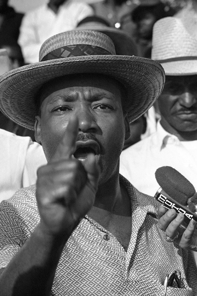 Dr. Martin Luther King addresses marchers in Senatobia, Mississippi, 1966.