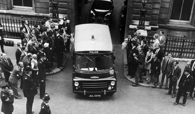 A police van carrying Ramon George Sneyd leaves Bow Street court in London, England, 1968.