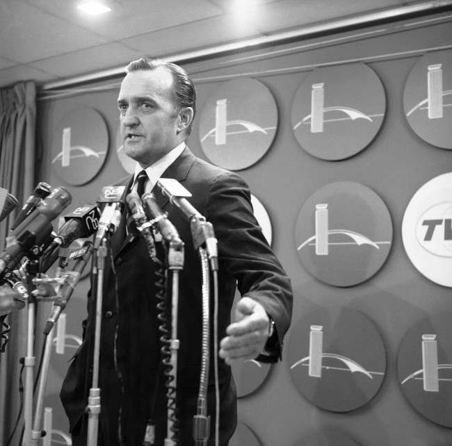 Arthur Hanes, attorney for James Earl Ray, holds a press conference at Kennedy International airport in New York City, 1968.