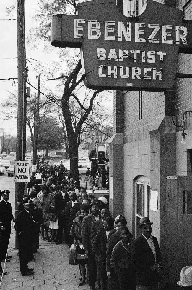 Mourners waiting to view the body of Dr. Martin Luther King Jr. line up outside the Ebenezer Baptist Church in Atlanta, 1968.