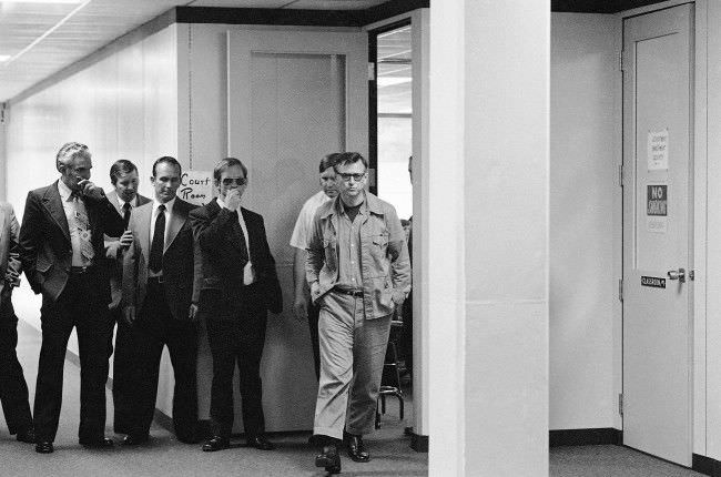 James Earl Ray, who is serving a 99 year sentence for the death of Dr. Martin Luther King, Jr., walks from the court room at Wartburg, Tennessee, 1977.